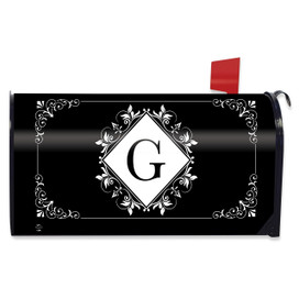 Black and white monogrammed mailbox cover with decorative floral design and large letter G.