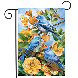 Bluebirds and Roses Garden Flag with three blue birds on yellow roses and green leaves.