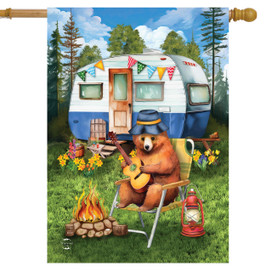 Camping Bear House Flag, brown bear in blue hat sitting by campfire with camper behind.