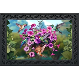 Hummingbirds and Petunias doormat with colorful hummingbirds and pink flowers on a hanging basket outdoors.