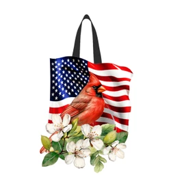 American Cardinal tote bag with USA flag design, red cardinal, and white flowers on black handles.