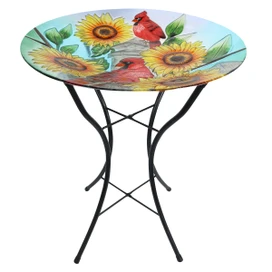 Cardinals and Sunflowers Glass Birdbath, round glass top with cardinals, sunflowers on black metal stand.