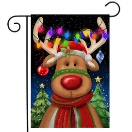 Festive Reindeer Garden Flag with red scarf and hat, colorful lights, and Christmas trees background.
