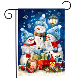 Singing Snowmen Garden Flag with three snowmen wearing hats and scarves singing carols with presents.