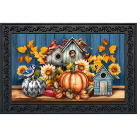 Fall Feathered Friends Doormat with birdhouses, pumpkins, sunflowers, and leaves on a blue background.