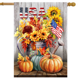 Americana Autumn House Flag with USA text, sunflowers, pumpkins, and fall leaves on a wooden background.