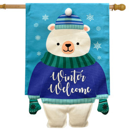 Polar bear burlap house flag with winter welcome text on blue snowflake background wearing scarf hat.