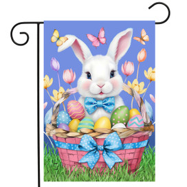 Easter Bunny Basket Garden Flag with colorful eggs, blue bow and butterflies on pink basket.