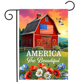 American Barn Garden Flag with red barn, American flag, flowers, and "America The Beautiful" text.
