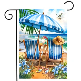 Beach Chairs Garden Flag with blue and white striped beach chairs and matching umbrella on sandy beach.