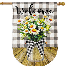 Welcome Farmhouse Jar Burlap House Flag with daisies and checkered ribbon on wooden table background.