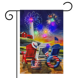 Beachfront Fireworks LED Burlap Garden Flag with patriotic beach chairs and lighthouse at sunset.
