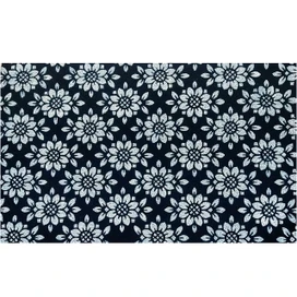 Geometric floral pattern on black coir doormat with white flowers and leaves, 30 x 48 inches.