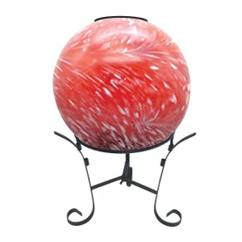 Red and white solar LED glass gazing ball on black metal stand with swirled design.