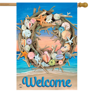 Briarwood Lane Driftwood Wreath Summer House Flag with colorful shells and welcome message on sandy shore.