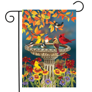 Briarwood Lane garden flag with colorful birds, fall flowers, and a birdbath on a small printed flag.