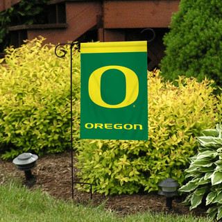 Briarwood Lane Oregon Ducks NCAA Licensed small garden flag with colorful printed design on display outdoors.
