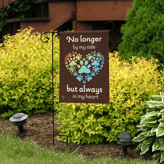 Briarwood Lane Pet Memorial Garden Flag with heart design, mourning message on brown background displayed outdoors.