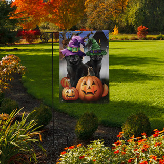Briarwood Lane Spooky Kittens Halloween Garden Flag with cats, jack-o-lantern, bats, and broom on display.