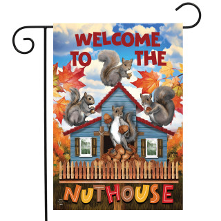 Briarwood Lane Nut House Fall Garden Flag with colorful squirrels and autumn leaves design displayed outdoors.