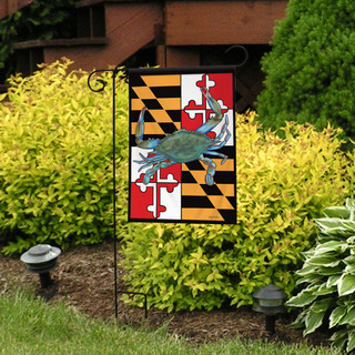 Briarwood Lane Maryland Crabs garden flag with colorful crab design on vibrant background near sunny yard.