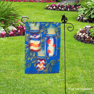 Briarwood Lane wrought iron garden flag stand holder in a decorative garden setting with flags hanger.