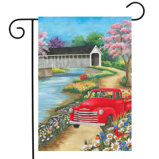 Briarwood Lane spring garden flag with colorful springtime scene and red truck by a covered bridge.