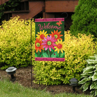 Briarwood Lane Welcome Daisies small printed garden flag with colorful springtime flowers on a lawn display.