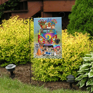 Briarwood Lane Groovy Pups Spring Garden Flag with colorful Volkswagon bus on a decorative yard display.
