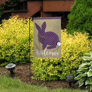 Briarwood Lane Cottontail Rabbit Spring Burlap Garden Flag with purple bunny and welcome text displayed outdoors.