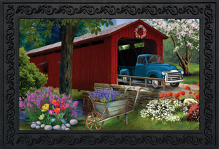 Briarwood Lane Bridge in Bloom Spring Doormat with colorful springtime scene and covered bridge design.