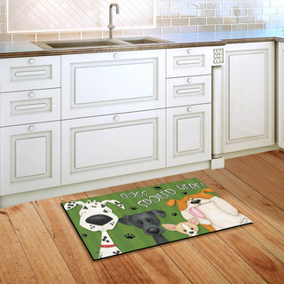 Briarwood Lane Spoiled Dogs Fall Doormat with colorful dog designs on a green background displayed indoors.