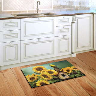 Briarwood Lane Goldfinch and Sunflowers small printed decorative doormat on a kitchen floor with sunflowers.