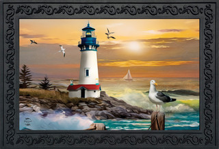 Briarwood Lane's colorful Sunset Lighthouse doormat displays a seagull, sun, and ocean on sand.