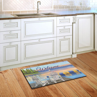 Briarwood Lane Waterfront Retreat doormat on wooden floor with lake, sand, and umbrella design.