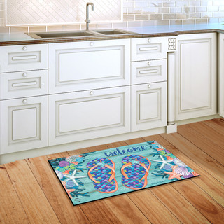 Briarwood Lane Enjoy Life Flip Flops Summer Doormat with colorful flip flops on wooden kitchen floor.