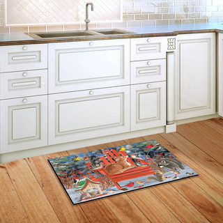 Briarwood Lane Snow Day Gathering doormat on kitchen floor with winter wildlife scene and fawn.
