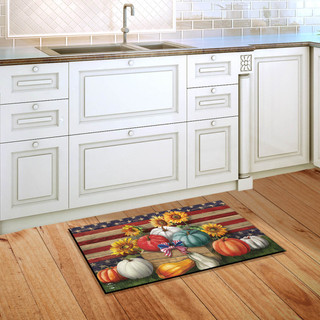Briarwood Lane Patriotic Pumpkins doormat on kitchen floor with American flag and red, white, blue colors.