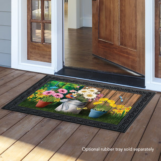 Briarwood Lane Spring Jubilee Floral doormat on a porch with colorful springtime flowers and decorative print.