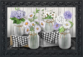 Briarwood Lane Checkered Mason Jars with colorful flowers, lilacs, daisies, and hydrangeas in a decorative display.