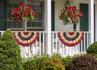 Briarwood Lane Tea Stained Patriotic Bunting 36"x18" applique bunting banners hanging on large patriotic flags.