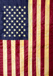 Briarwood Lane Tea Stained Embroidered American Garden Flag with gold stars and stripes on stand set.
