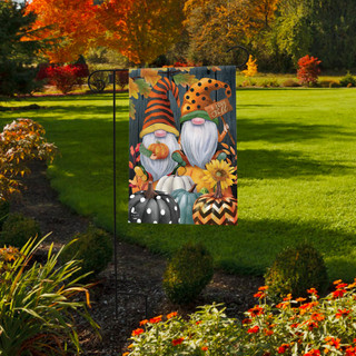 Briarwood Lane garden flag with cheerful gnomes, pumpkins, and polka dots for fall display outdoors.