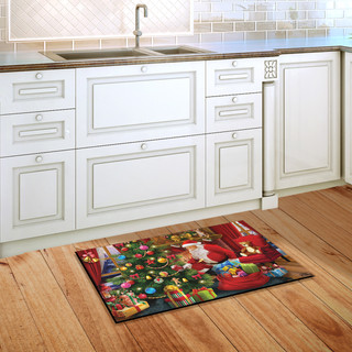 Briarwood Lane's The Magic of Christmas doormat with Santa and tree on wooden kitchen floor.