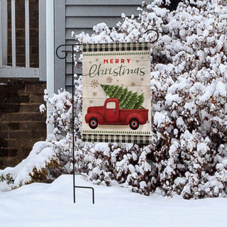 Briarwood Lane Merry Christmas garden flag with red truck, spruce, and checkered border on snowy porch.