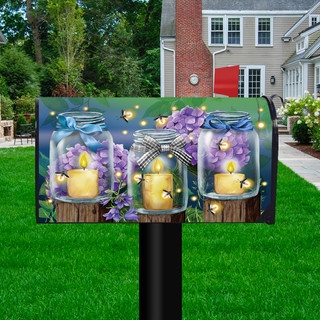 Briarwood Lane Fireflies Spring Mailbox Cover with purple flowers and lit candles in glass jars.