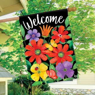 Briarwood Lane Whimsy Flowers Spring House Flag with colorful blooms and Welcome text on black background.