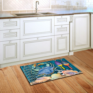 Briarwood Lane Crab Walk Summer Doormat on wooden floor in front of white kitchen sink area.