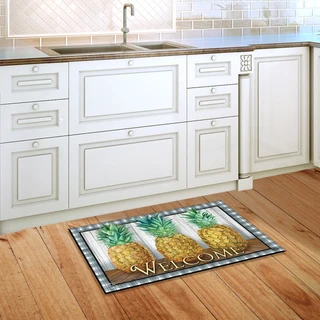 Briarwood Lane small printed pineapple doormat with colorful design on kitchen floor, perfect for springtime.
