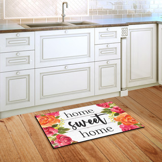 Briarwood Lane Farmhouse Home Sweet Home floral doormat on wooden floor, colorful springtime decorative mat.